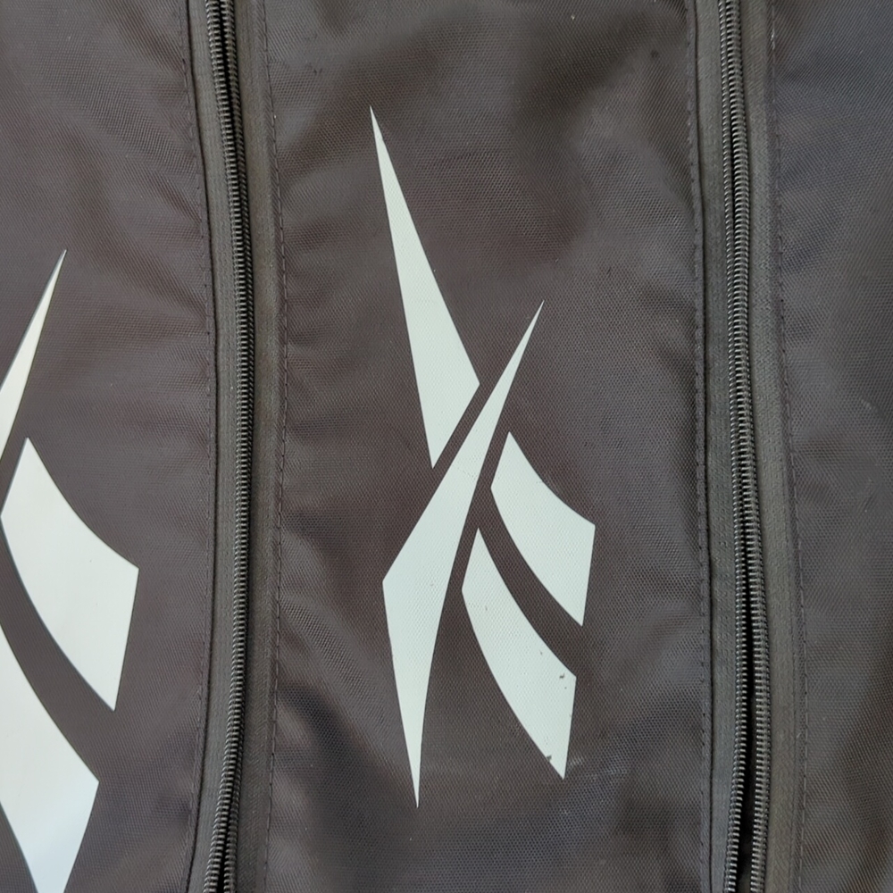 Black Reebok Backpack With Unique Tiered Zipper Pocket Design - Picture 10 of 15